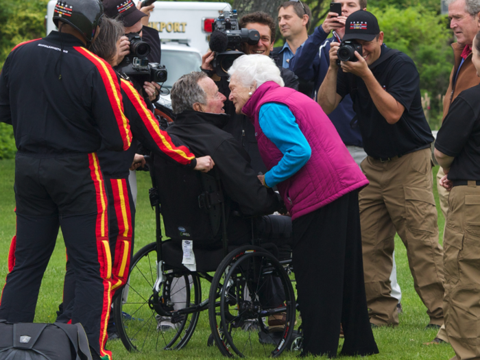 He saved a kiss for his wife, Barbara, upon his safe return.