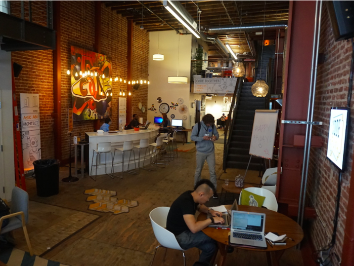 The place gives off the vibe of a cool startup working space. The brick wall and swanky decorations look nice.