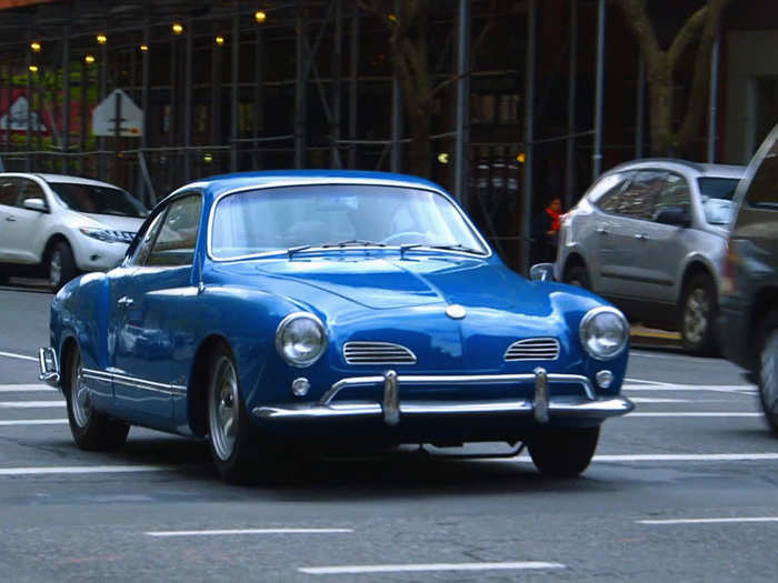 The Karmann Ghia, named for the contributing Italian design firm Ghia and German coach builder Karmann, is a true outlier in the history of Volkswagen. Joel Hodgson was the guest.