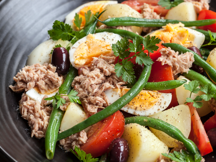 Originally from Nice, the salade nicoise is a combination of lettuce, tomatoes, hard boiled eggs, tuna, anchovies, olives, and green beans.