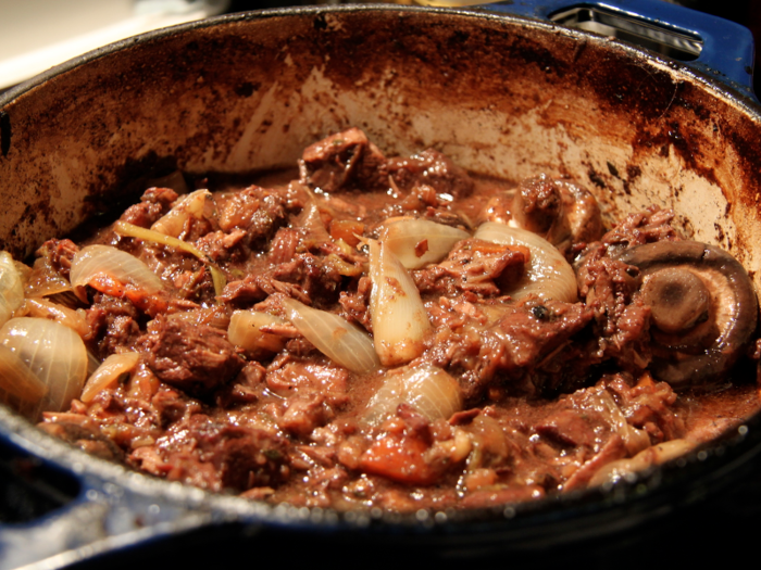 Bœuf Bourguignon is a traditional hearty French stew from the Burgundy region that mixes together beef, vegetables, garlic, and of course, red wine.