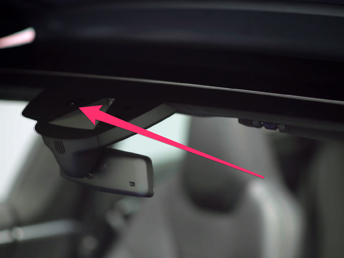 23. The Model S has a rain sensor located on the inside of the windshield at the base of the rear view mirror. When wipers are on "auto," the frequency at which they wipe depends on how much the sensor detects; if it