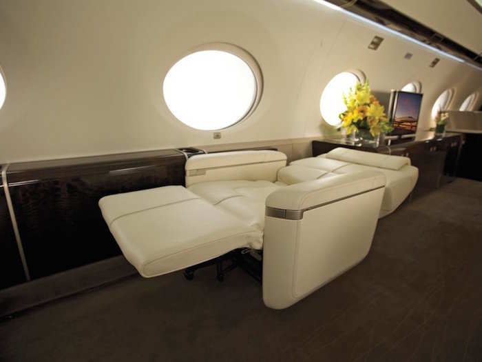 The jet comes with plush lounge chairs that can recline all the way back when you want to sleep.