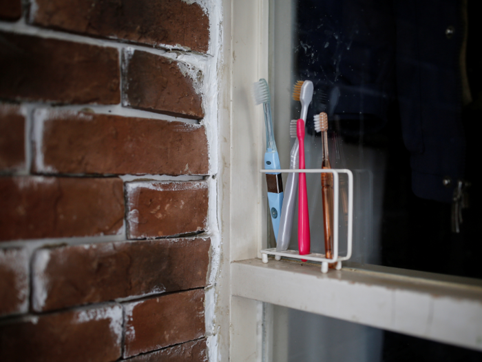 Sink counters exist to keep stuff on them. All you need is a toothbrush, and that doesn