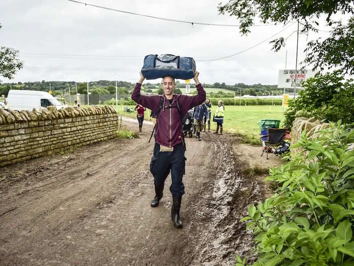 ...and this festival-goer, who seems a lot happier to be at Glastonbury.