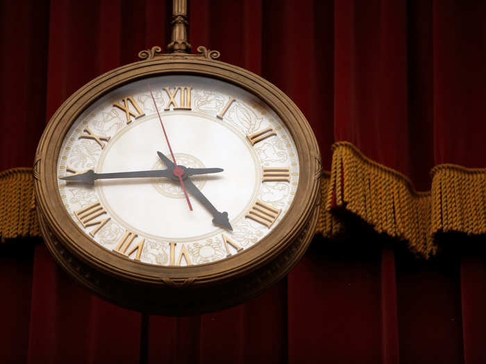 A clock hangs above the bench in the courtroom.