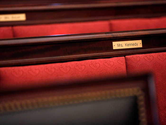 Name plates mark the spaces reserved for justices