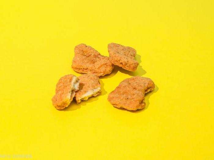 On first bite, we taste a little kick — possibly thanks to the noticeable pepper flakes in the breading. But these nuggets have a spongy texture that feels questionable.