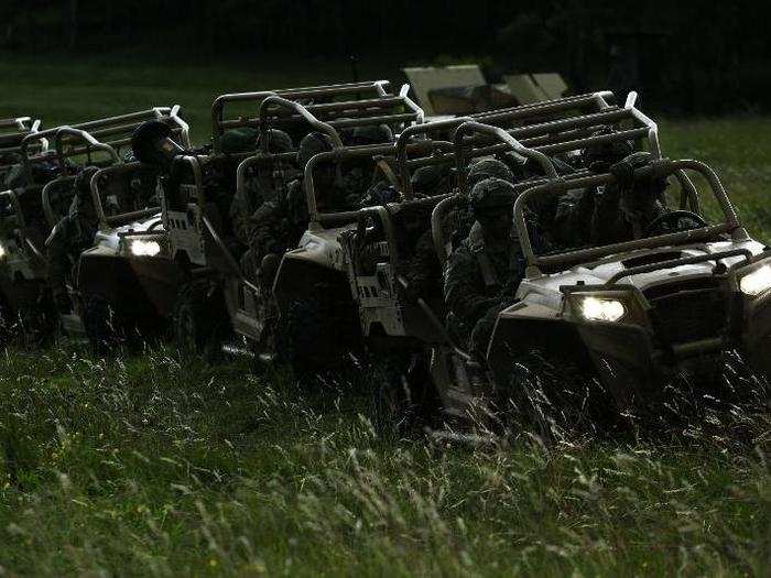 US soldiers of Chaos Company, 504th Parachute Infantry Regiment, 82nd Airborne Division prepare to move out with their Light Tactical All Terrain Vehicles.
