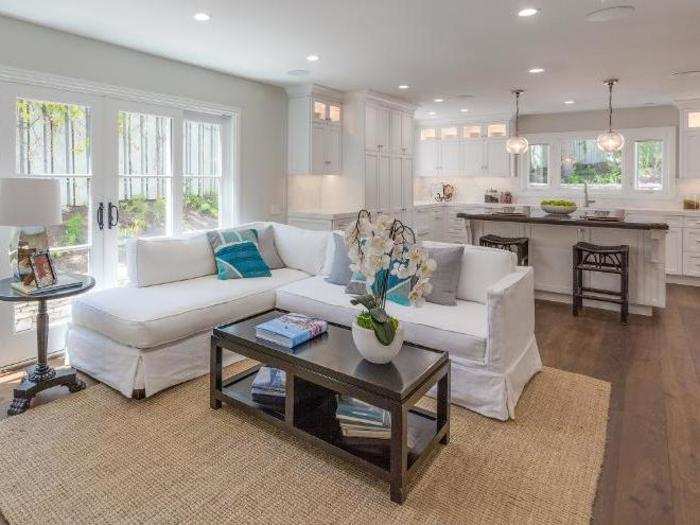 Another seating area leads to the open kitchen.