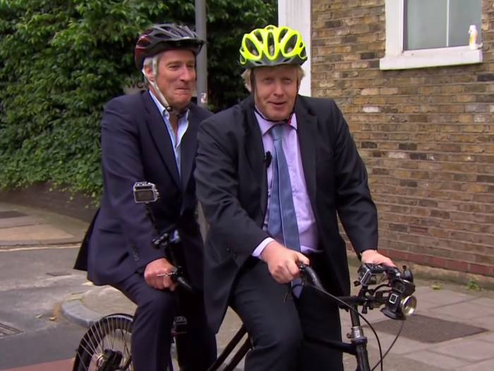 But his critics called him an inactive Mayor, using the position to boost his personal publicity. Here he is with BBC presenter Jeremy Paxman on a tandem bike.