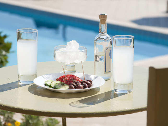 GREECE: Ouzo — Greeks make happy hour happier by drinking their ouzo (a local anise-flavoured aperitif) straight.