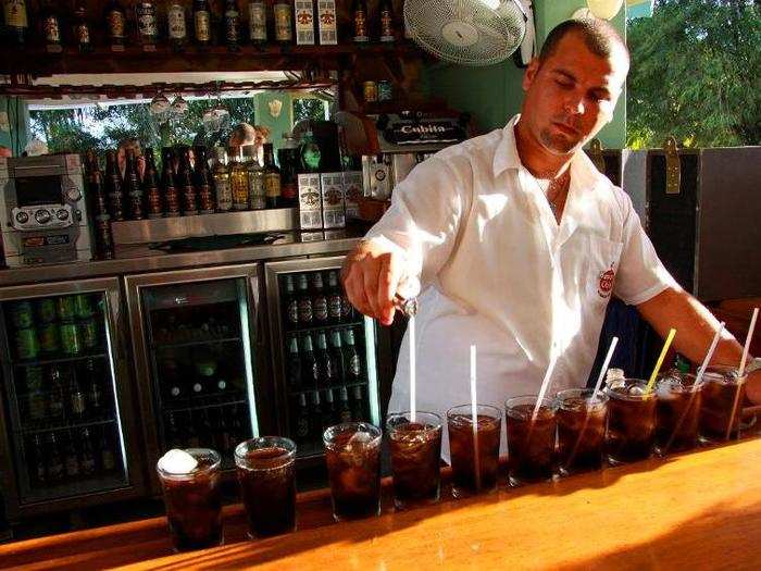 VENEZUELA: Cuba Libre — light Venezuelan rum mixed with Coke is simple yet beloved.