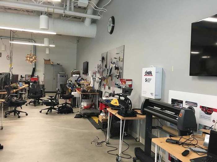 It has large scale printers, a full-color blueprint printer, shop vacs, all sorts of goodies and gadgets found in the best-equipped garage machine-shops.