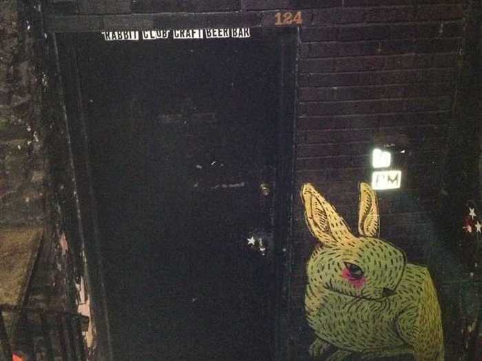 124 Old Rabbit Club has a rabbit painted on its entrance.