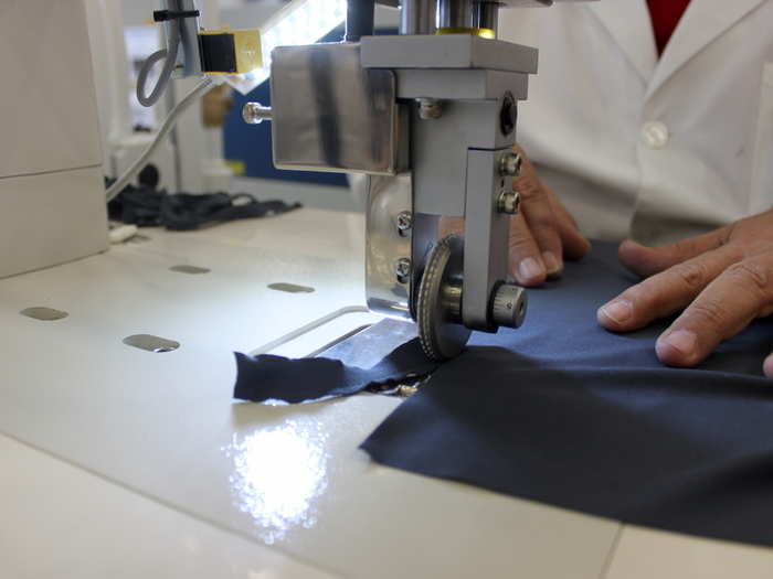 Lighthouse employees are constantly working to improve the design process. Pictured below is a sewing machine that can temporarily bind fabric without making a single stitch.