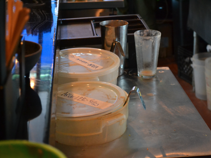 Kava is stored in these bins behind the bar.