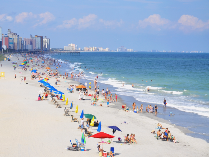 15. Head to Myrtle Beach in South Carolina for an extensive stretch of soft white sands and activities that range from fishing and swimming to sailing and surfing.