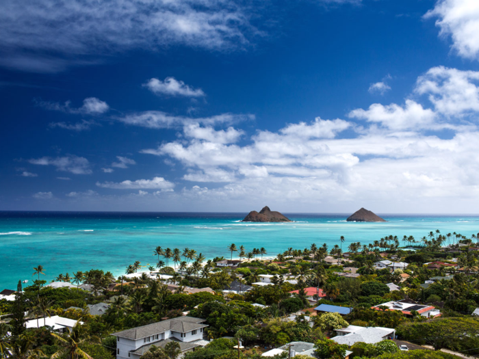 14. Lanikai Beach — which translates to "heavenly sea" — is located on the coast of Oahu and has warm turquoise waters that brush against its soft sand beach. Head here to enjoy relaxing on the sand or to take a swim in clear blue waters.