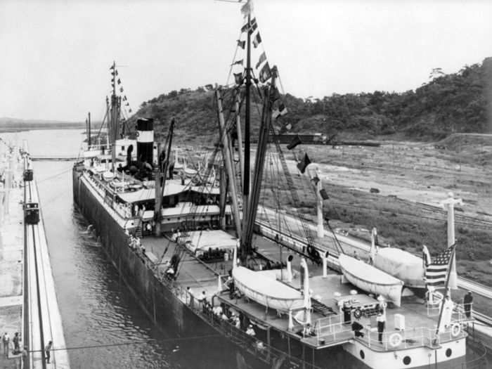 The first boat to cross the Panama Canal was the SS Ancon in 1914, which carried a cargo of cement.