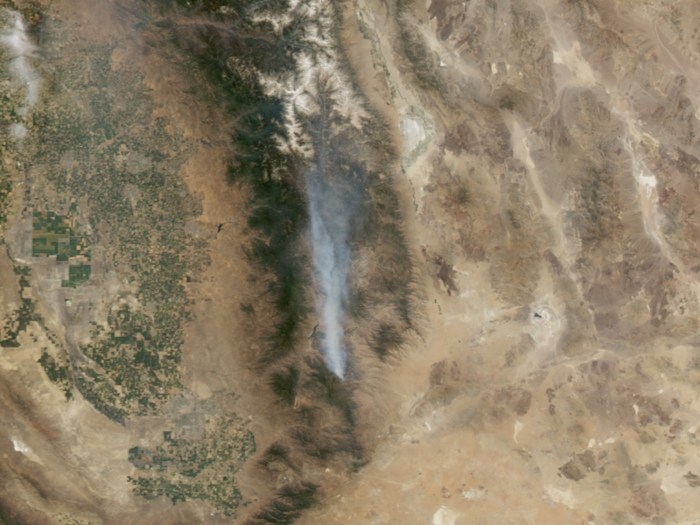 The fire is so big, its smoke plume can be seen from space.