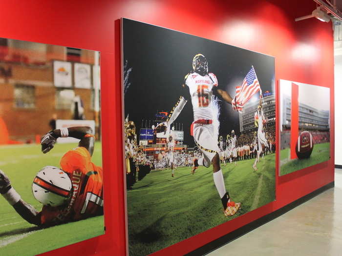 The walls are covered in images of emotional wins throughout sports history ...