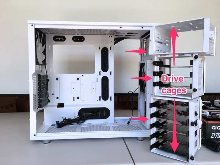 Once the feeding process was complete, I took out the "drive cages" that usually house hard drives and CD drives on the right of the case.