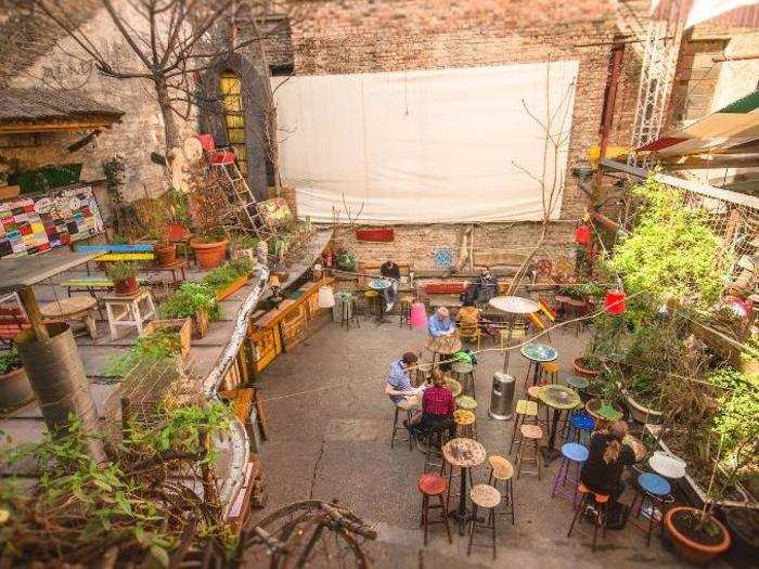 Hang out at Szimpla Kert, one of the "ruin pubs" that sprung out of abandoned buildings in Budapest