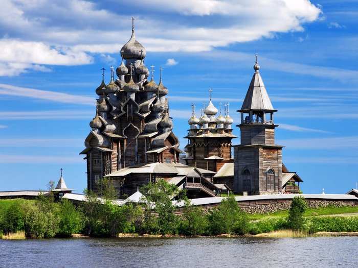 Head to the Russian island of Kizhi on Lake Onega to admire the Church of the Transfiguration, a magnificent pine log sculpture topped with domes.