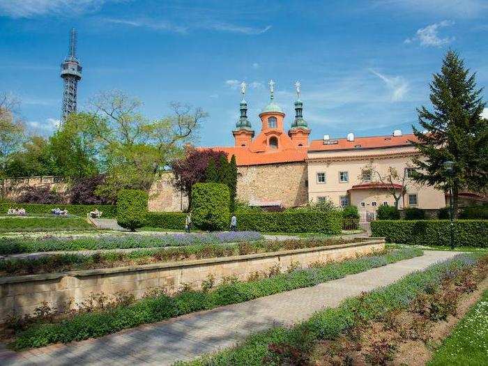 In Prague, take a funicular up Petrin Hill to stroll through a verdant rose and lavender garden and climb the steps of the Petrin Tower — a 210-foot-tall steel structure often called Prague