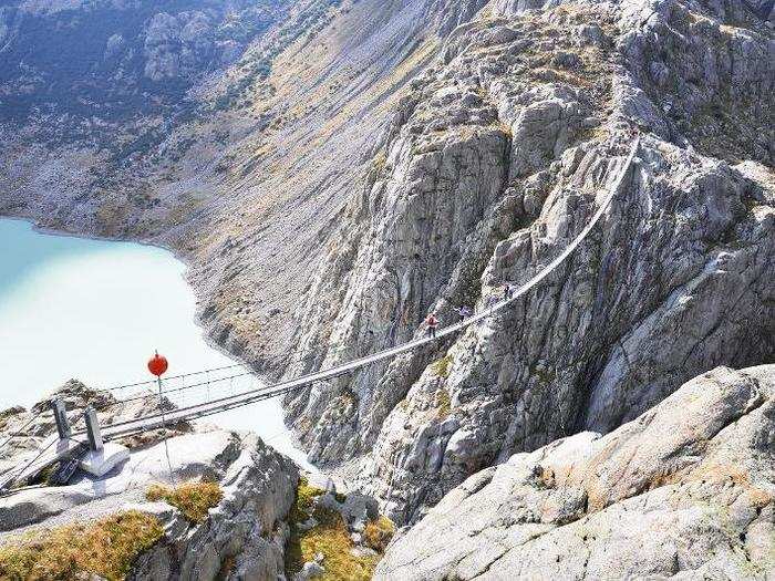 Hold your balance on the Trift Bridge, the longest suspension bridge in the Alps.