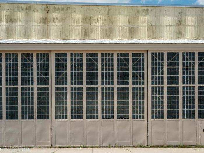 The doors of Hangar B. When built during the second world war, the Navy intended the structure to be temporary. That was the case with hangars built to the same designs at Naval Air Stations around the world.