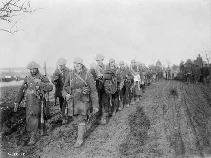 Canadian soldiers return from trenches during the Battle of the Somme, France in 1916.