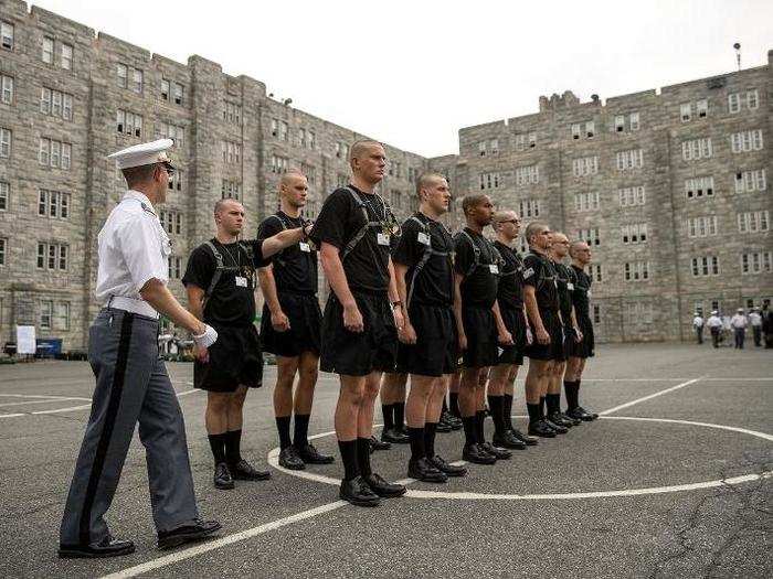 An older cadet surveys the form of new candidates.