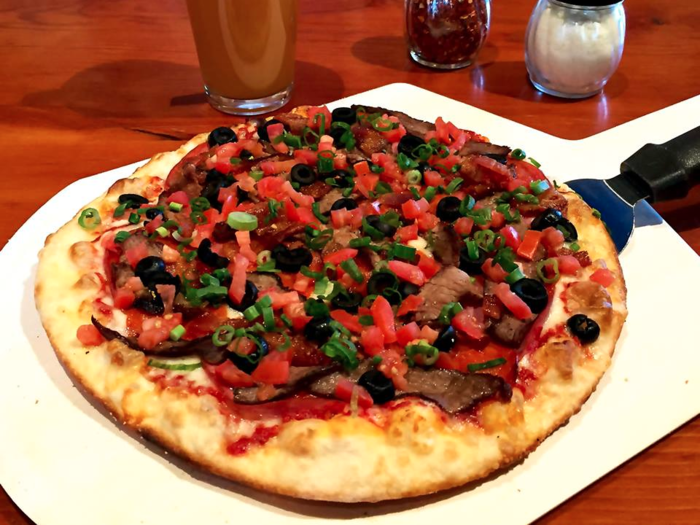 Eat pizza and drink house-made beer at Moose