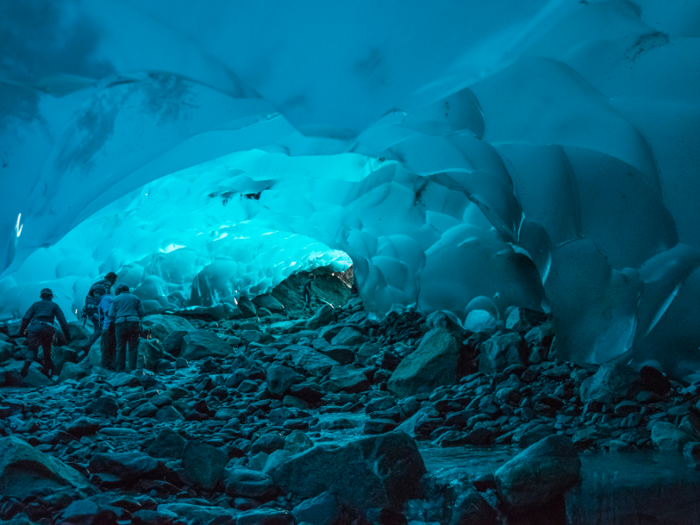 Trek to the eerie blue caverns of the Mendenhall Ice Caves at Mendenhall Glacier, outside of Alaska