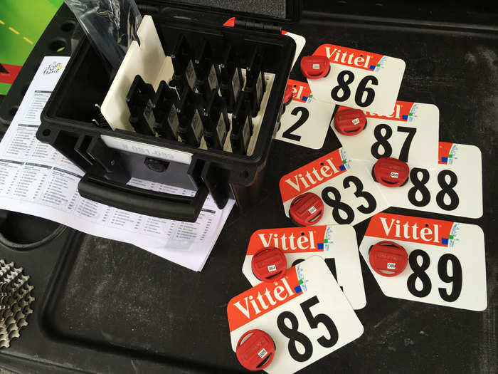 These are the official transponders that riders must have on their bikes in the Tour de France. They keep track of each rider