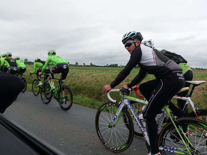 Some local cyclists joined the action, but after a while the sporting directors asked them to hang back a little bit behind the team. It can be dangerous when amateurs get too close to the pros. If the pros have to make a sudden stop, it could spell disaster for all involved, so it