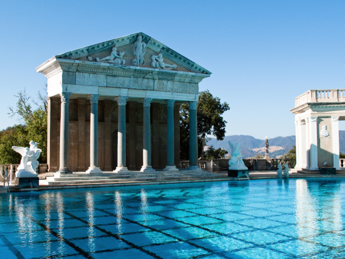 Go for a dip in a luxurious pool, like the Neptune Pool in the historic Hearst Castle in San Simeone, California, which is open to the public for a fee.