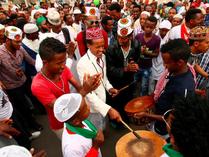 ETHIOPIA: Music plays a big part in the celebrations. Ethiopian Muslims sing and play instruments as they celebrate the end of the holy fasting month in Addis Ababa.