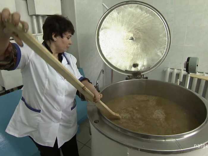 Inmates are fed soup and bread.