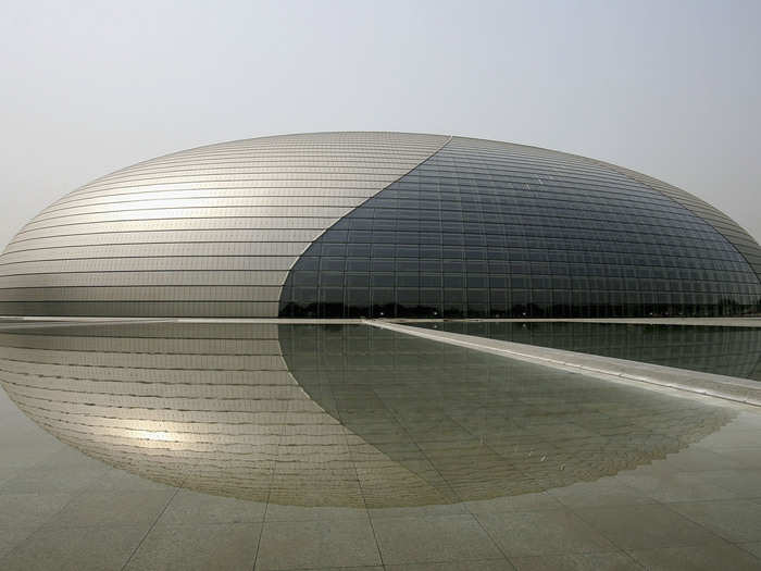 NATIONAL CENTER FOR THE PERFORMING ARTS: Often called the Giant Egg, this titanium dome in Beijing seats 5,452 people and sits on an artificial lake.