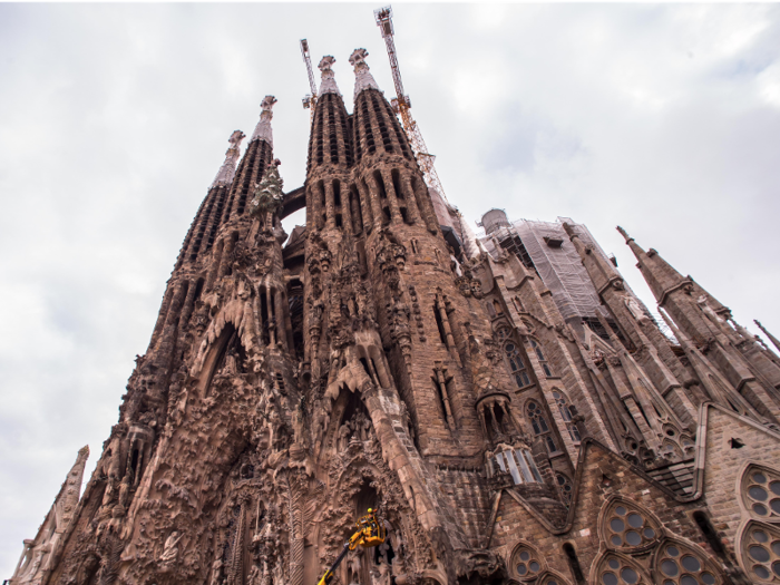 SAGRADA FAMILIA: This ornate Roman Catholic basilica towers over Barcelona. Construction on the church began in 1882 and still continues to this day.