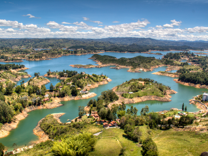 Climbers are rewarded with a stunning view of Guatapé.