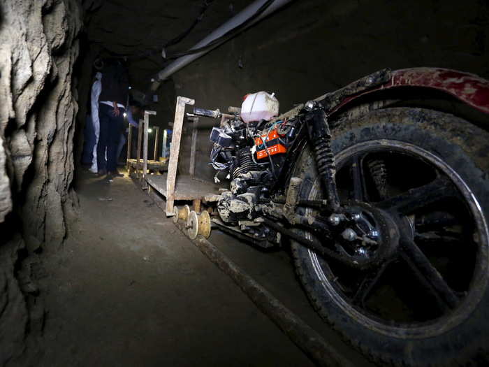 The secret passage was illuminated, ventilated, and equipped with a motorcycle modified to run on rails.