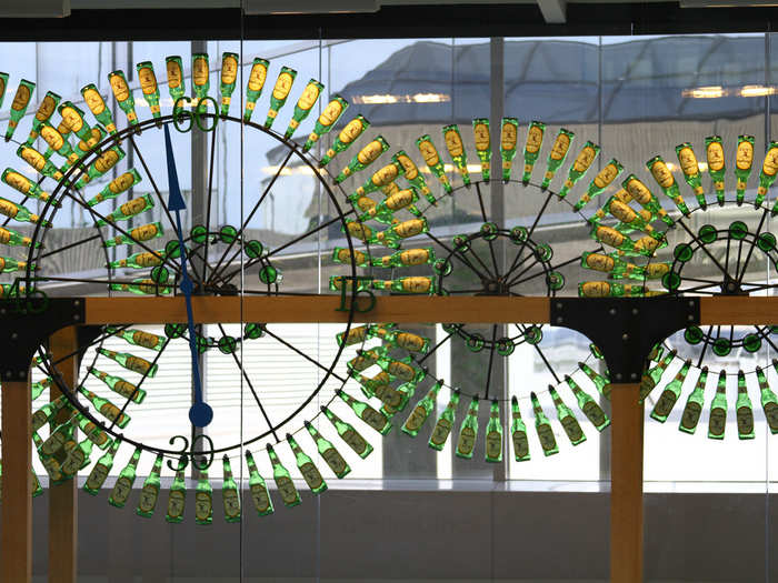 Philadelphia International Airport used to hold these beer-bottle clocks in Terminal A. The mechanism was designed by Rick Stanley and his son Vince of Stanley Clockworks and uses 300 recycled Yuengling bottles to create a 21-foot long working time system.