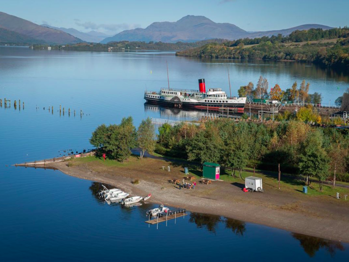 Appreciate the tranquility of Loch Lomond, the largest freshwater lake in Scotland. Situated between the Lowlands and Highlands, it