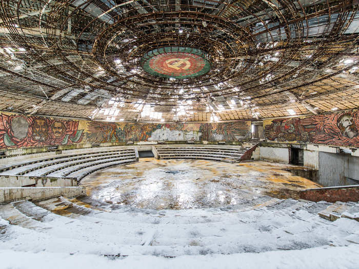 Time has weathered the Buzludzha Monument, a remarkable saucer-shaped building atop a mountain in Bulgaria. The building once served as the Bulgarian Communist party headquarters.