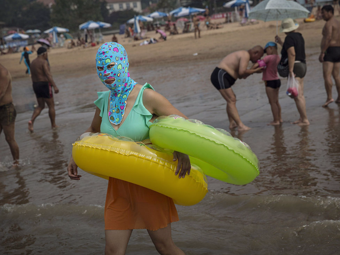 Similar to a balaclava or hijab, the masks are made of waterproof materials. Some even have fun designs.