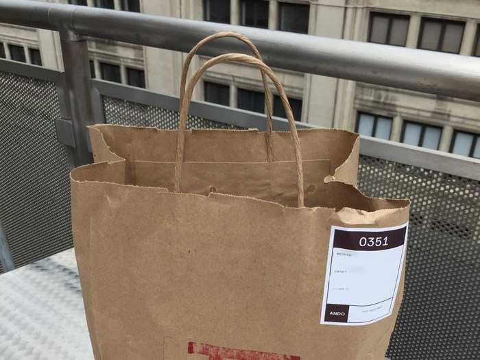 Ando comes in a pretty typical paper take-out bag. It was sent via Uber Rush to our offices, significantly outside of Ando